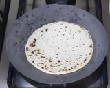A picture of step 4 of Chicken tortilla wrap.