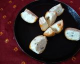A picture of step 4 of Orange wedges icecream.