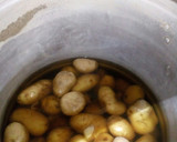 Foto del paso 1 de la receta: Papas rellenas (kisses)