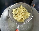 A picture of step 4 of Pasta In Arabiata Sauce With Cheese Chilli Toast.