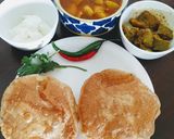 A picture of step 6 of Masala kachori with aloo tamatar curry.