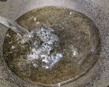 A picture of step 1 of ময়দার রুটি.