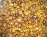 A picture of step 15 of Ashtami special prasaad the puri chana and halwa thali.