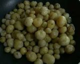 A picture of step 2 of Baby Potato Curry with Green Peas.