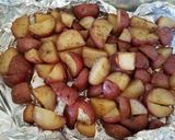 A picture of step 7 of Rosemary & Garlic Red skin potatos.
