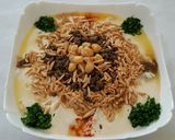 صورة لخطوة 9 من وصفة فتة حمص باللحمةطعم رووعة 👍😋