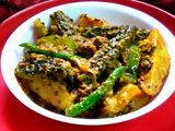 আমন্ড করলা (almond karola recipe in Bengali)