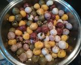 A picture of step 7 of Rainbow Brown Rice Ammini Kozhakattai.