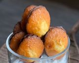 Foto del passaggio 8 della ricetta Madeleines Glassate al Cioccolato con il Cuore di Miele