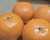 A picture of step 2 of Cream Custard shots with orange sauce.