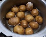 A picture of step 1 of Baby potatoes kashmiri dum aloo.