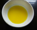 A picture of step 2 of Eggless mango bread custard pudding.