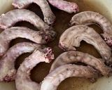 A picture of step 2 of Balsamic vinegar chicken necks -cook every part.