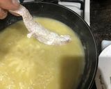 Foto del paso 7 de la receta Rape y merluza en salsa de ajo y vino blanco