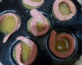 A picture of step 3 of Egg sausage Cups.