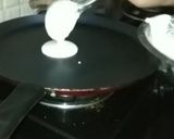 A picture of step 10 of Instant suji masala dosa.