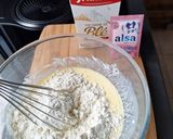 Une image de l'étape 1 de Gâteau au yaourt et framboises.