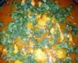 A picture of step 10 of authentic Indian chicken curry.