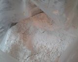 A picture of step 2 of Pepper floured pork chops.