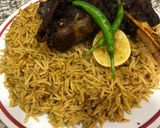 A picture of step 7 of Mandi lamb and rice.
