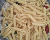 Foto del paso 9 de la receta: Penne Rigate al Wok con Calabacín, Cherry y Salmón Ahumado