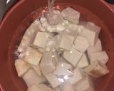 A picture of step 1 of White yam and tomato sauce.