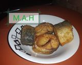 A picture of step 3 of Flour coated fish.