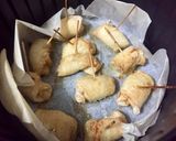A picture of step 5 of Air Fryer-Style Chicken Breast Rolls.