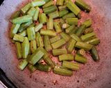 A picture of step 2 of Achari Chicken Bindi.