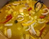 A picture of step 6 of Thai Pineapple Curry with Seafood.