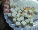 A picture of step 2 of Rosgolla naboratan korma.