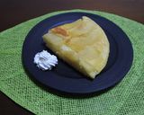 A picture of step 9 of Easy Apple Cake with a fry pan.