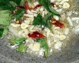 A picture of step 2 of Farfalle Pasta with cheese & Schezwan sauce.