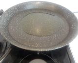Foto del paso 7 de la receta Paella al HORNO de espinacas y gamba pelada