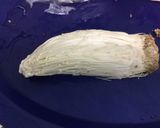 A picture of step 1 of Bacon Wrapped Enoki Mushroom Pita Sandwich.