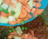 A picture of step 3 of Carrot Potato peas vegetable.