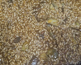 Foto del paso 7 de la receta: Arroz meloso de alcachofas y conserva de pota en su tinta