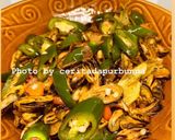Foto langkah ke 5 dari resep Tumis Kerang kupas cabai hijau.