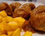 A picture of step 10 of Spanish-Style Meatballs in Sauce.