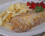 Foto del paso 4 de la receta: Escalope de ternera al horno con patatas fritas