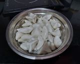 A picture of step 8 of Traditional Bhapa Pithe.