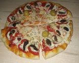 Foto del paso 7 de la receta: Pizza especial de pollo y jamón
