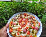 A picture of step 7 of Veggies Delight Pizza.