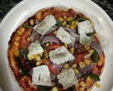 A picture of step 3 of Cheesy paneer pizza.