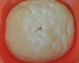 A picture of step 7 of Baked Doughnuts.