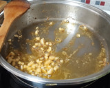 Foto del paso 3 de la receta: Fideos con alcachofas, brócoli y langostinos