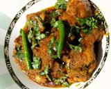 A picture of step 15 of Kadai Chicken.