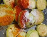 A picture of step 1 of Brinjal disk or baigan bhaja.