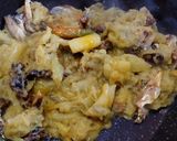 A picture of step 12 of Ilish Maacher Matha Diye Kochu Shaak.