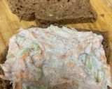 A picture of step 4 of Curd sandwich 🥪/cucumber/carrot mix with curd.